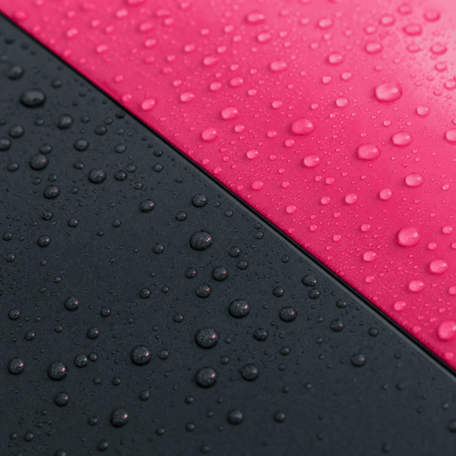 Close-up of a bubble-free lorry sticker surface beaded with rainwater